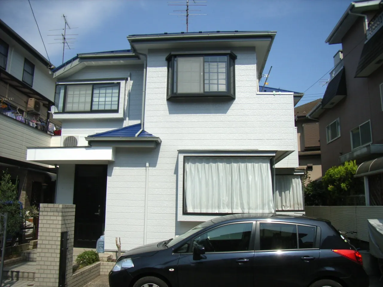 川崎市多摩区の住宅街にある戸建ての外壁塗装および屋根塗装工事